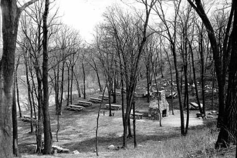 The fireplace surrounded by picnic tables in 1935. (Minnesota Historical Society)